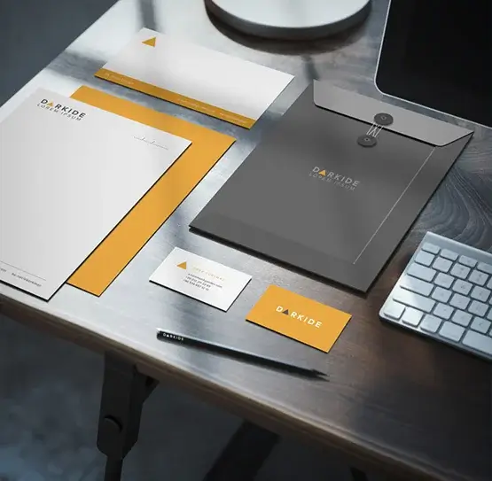An image displaying a set of branded stationery items, including letterheads, envelopes, and business cards, with cohesive design elements.
                                                                
